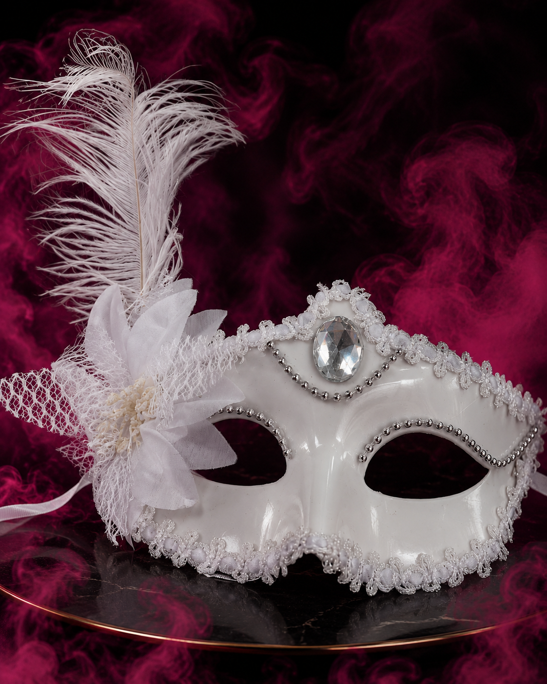 Antifaz con strass y pluma
